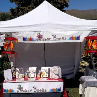 market stall at Wanaka Fete. Colourful and enticing.